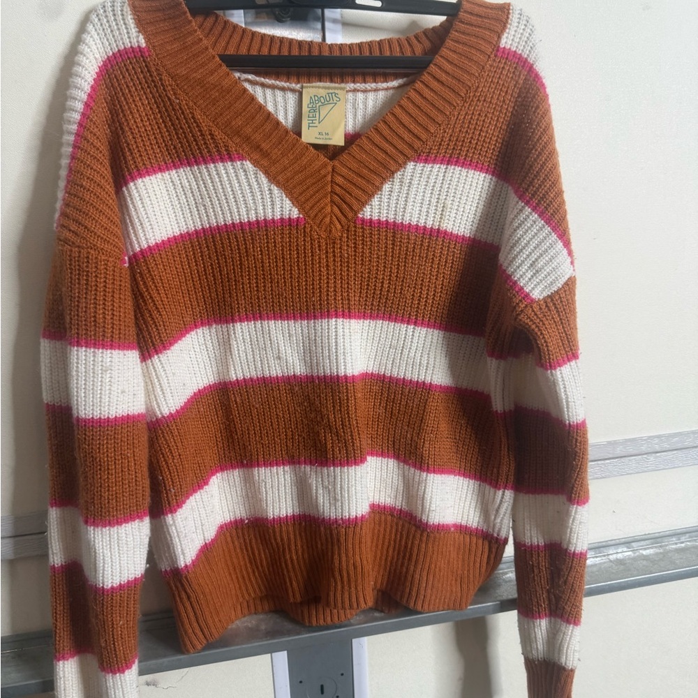 Stylish V-Neck Sweater in Brown, White, and Pink